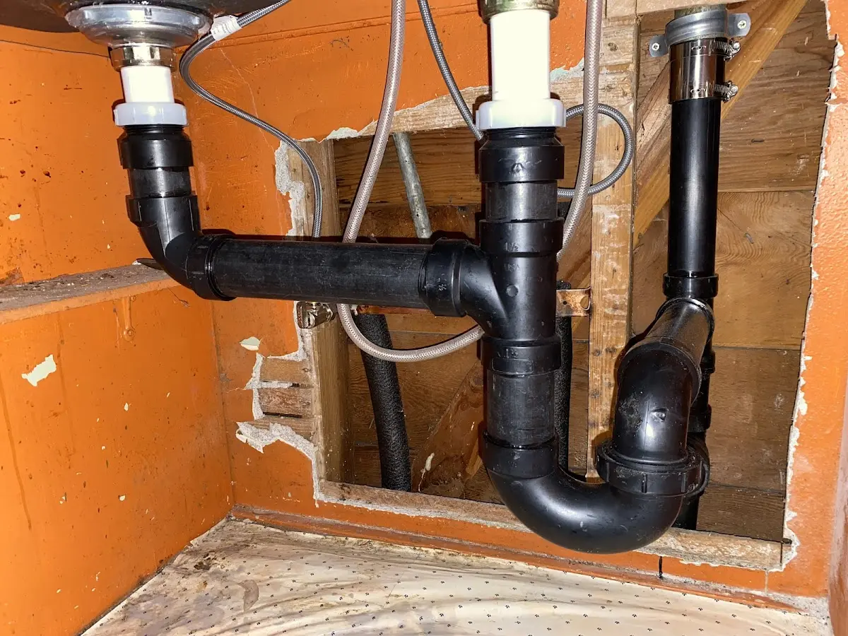 Professional Garbage Disposal Repair equipment and tools on the job in Tabor City